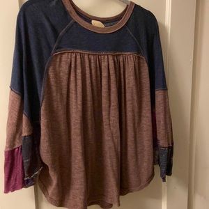 Very cute free people top. Wide sleeves with great details